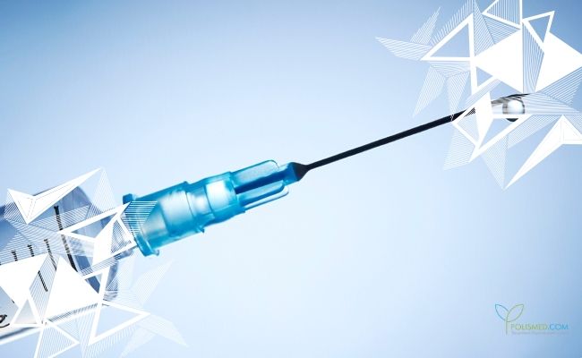 Шприц с каплей на конце